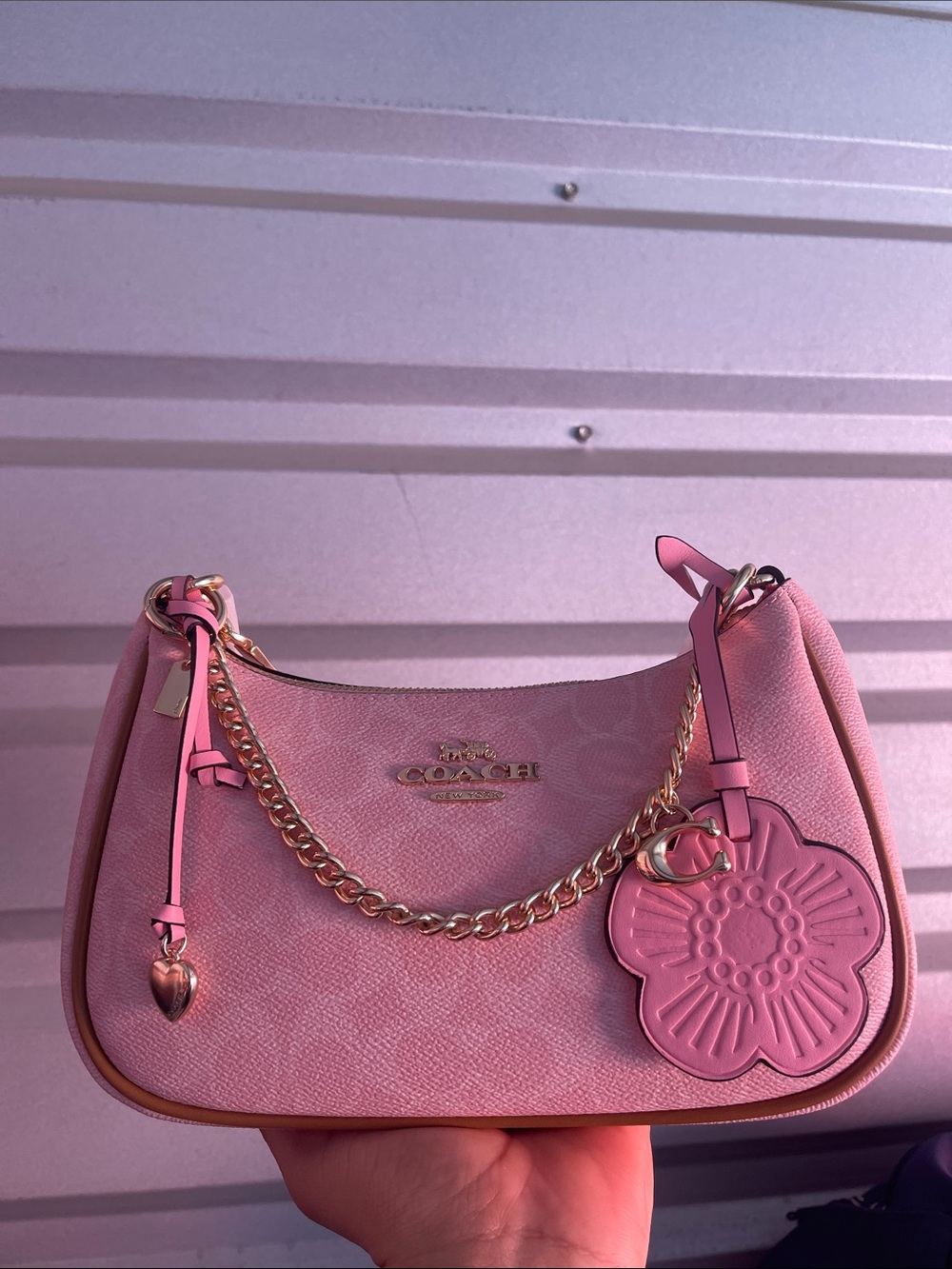 Coach Pink Leather Shoulder Bag with Floral Charm and Gold Chain